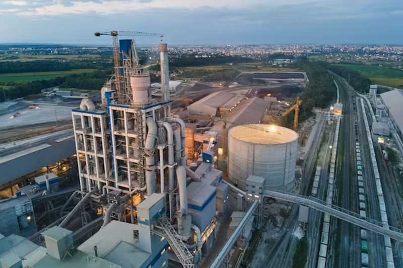 Cement plant with kiln towers and silos
