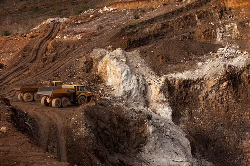 Haul trucks working an open-cast mine