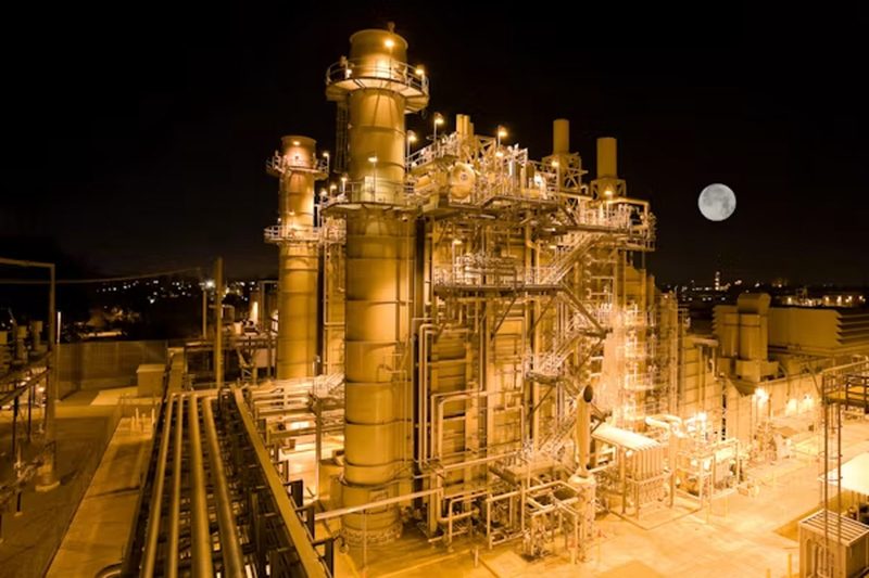 Power generation plant illuminated at night