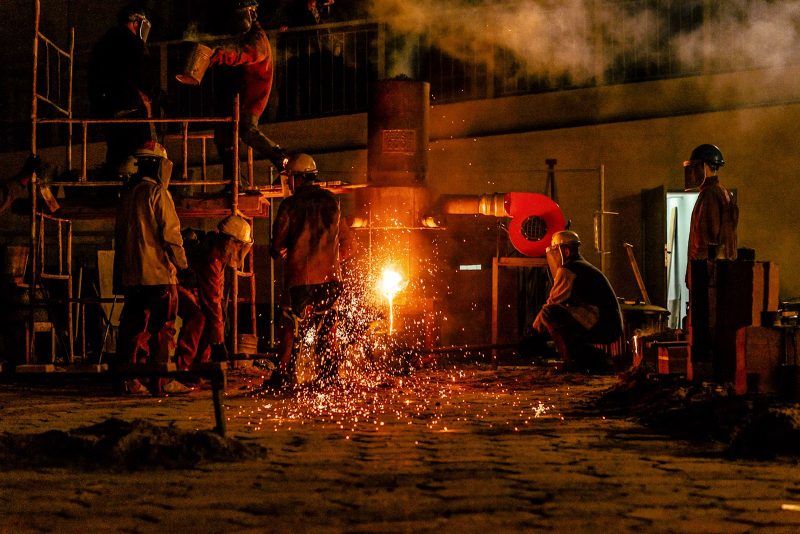 Molten metal being poured at a steel plant